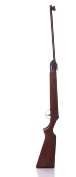 rusty pneumatic air rifle isolated on white background