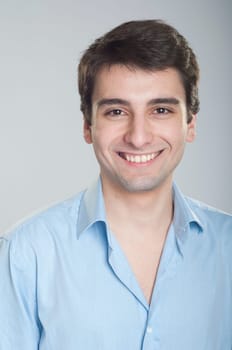 portrait of a smiling handsome trainee starting business career