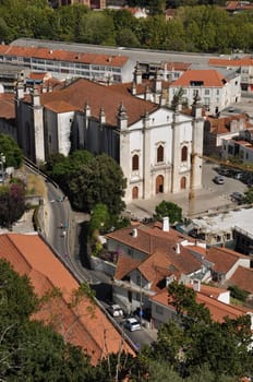 Leiria Sé cathedral (from the XVI century) and cityscape view of Leiria, Portugal (blue sky)