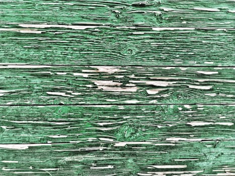 wooden wall with old green paint. High quality photo