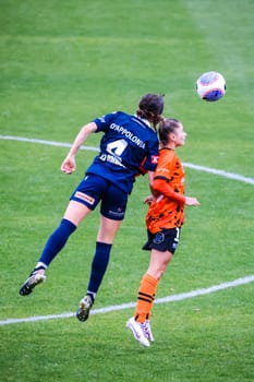 MELBOURNE, AUSTRALIA - OCTOBER 15: Sara D'Appolonia of Melbourne Victory and Sharn Freier of Brisbane Roar battle for the ball at La Trobe University Sports Fields on October 15, 2023 in Melbourne, Australia