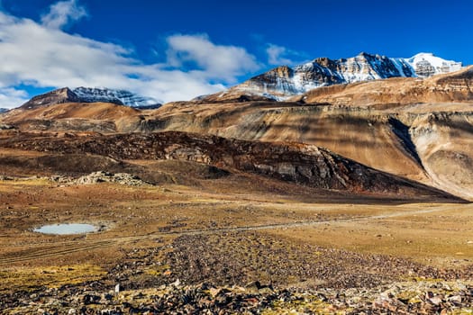 Himalayan landscape in Himalayas along Manali-Leh with small lake road view from Baralacha La Pass. Himachal Pradesh, India