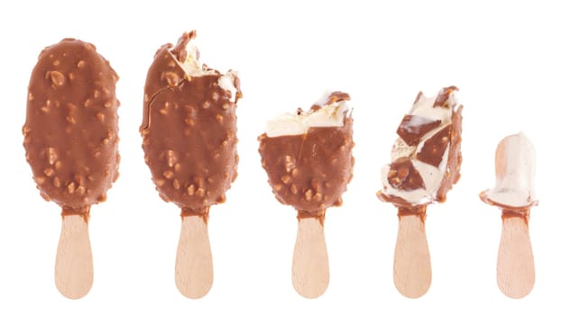 delicious almond chocolate ice cream (being eaten up, sequential images) isolated on white background