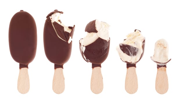 delicious milk chocolate ice cream (being eaten up, sequential images) isolated on white background
