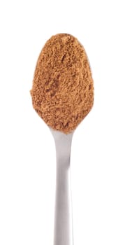 cumin spice on a stainless steel spoon, isolated on white background