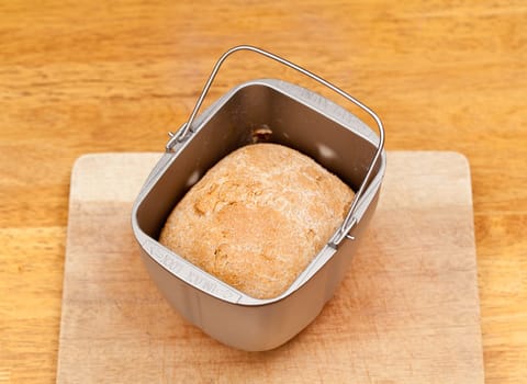 Bread making machine baking a whole wheat loaf