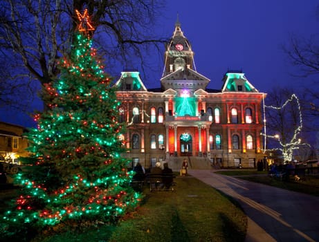 CAMBRIDGE, OHIO - NOVEMBER 24: Christmas lighting on the old Court House building in Cambridge Ohio on November 24, 2011. This annual event uses Dickens characters on the main street.