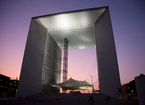 PARIS - SEPTEMBER 21: La Grande Arche in Paris at sunset. La Grande Arche is 110m high and was inagurated in July 1989