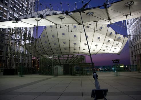 PARIS - SEPTEMBER 21: La Grande Arche in Paris at sunset. La Grande Arche is 110m high and was inagurated in July 1989