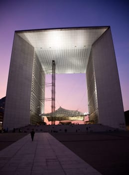 PARIS - SEPTEMBER 21: La Grande Arche in Paris at sunset. La Grande Arche is 110m high and was inagurated in July 1989