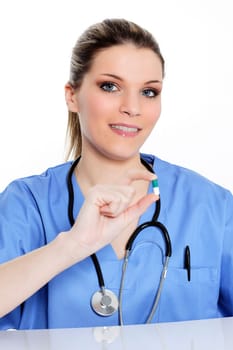 woman doctor with pill in the hand
