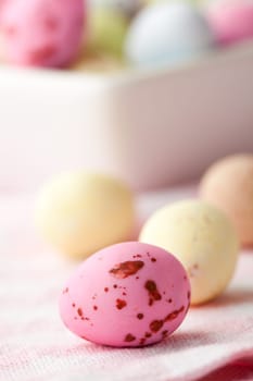 Close-up of pastel colored chocolate Easter egg candy