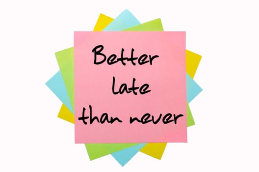 text "Better late than never"" written by hand font on bunch of colored sticky notes"