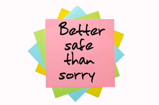text "Better safe than sorry"" written by hand font on bunch of colored sticky notes"