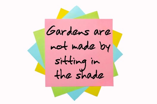 text "  Gardens are not made by sitting in the shade "" written by hand font on bunch of colored sticky notes"