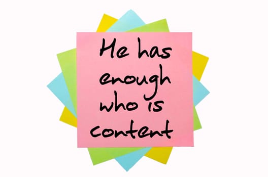 text "  He has enough who is content "" written by hand font on bunch of colored sticky notes"