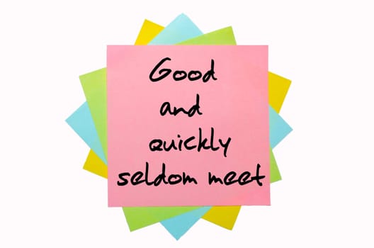 text "  Good and quickly seldom meet "" written by hand font on bunch of colored sticky notes"