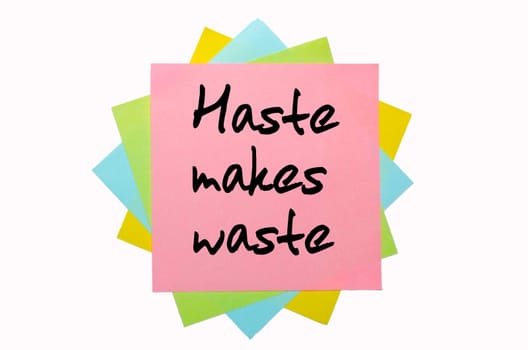 text "  Haste makes waste "" written by hand font on bunch of colored sticky notes"