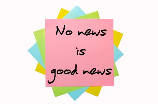 text " No news is good news "" written by hand font on bunch of colored sticky notes"