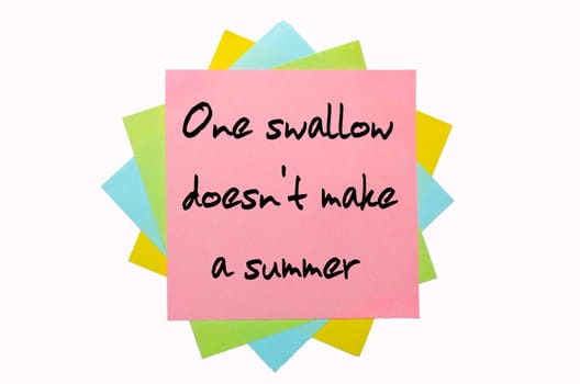 text " One swallow doesn&#039 t make a summer "" written by hand font on bunch of colored sticky notes"