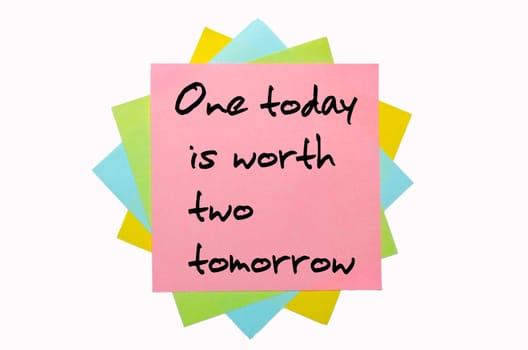 text " One today is worth two tomorrow "" written by hand font on bunch of colored sticky notes"