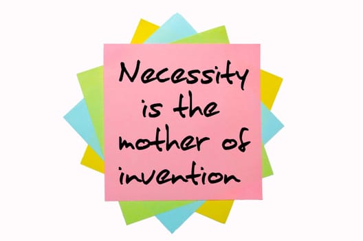 text " Necessity is the mother of invention "" written by hand font on bunch of colored sticky notes"