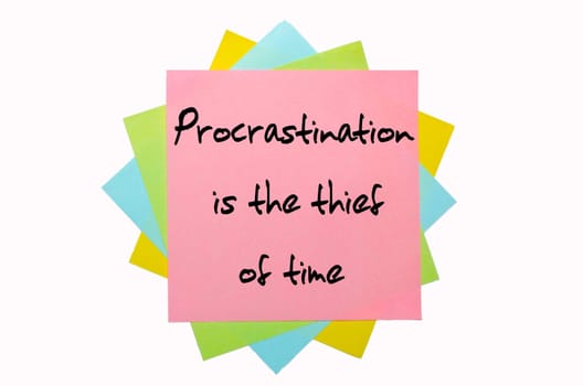 text " Procrastination is the thief of time "" written by hand font on bunch of colored sticky notes"