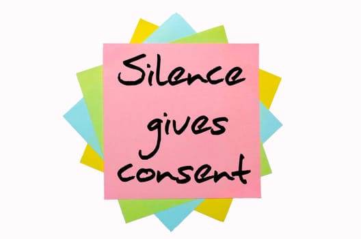 text " Silence gives consent "" written by hand font on bunch of colored sticky notes"