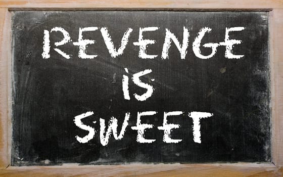 Blackboard writings "Revenge is sweet"""