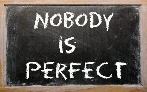 Blackboard writings "Nobody is perfect"""