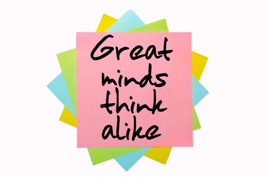 text "   Great minds think alike "" written by hand font on bunch of colored sticky notes"