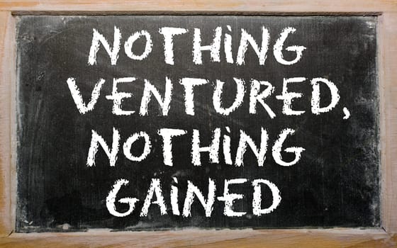 Blackboard writings "Nothing ventured, nothing gained"""