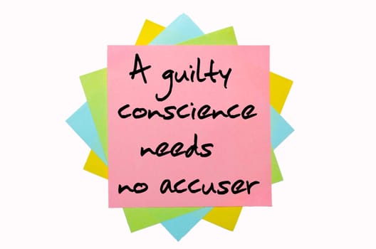 text "A guilty conscience needs no accuser"" written by hand font on bunch of colored sticky notes"