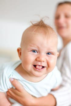 the newborn baby with his mother