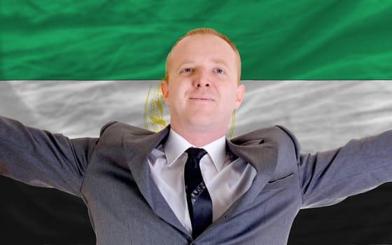 joyful investor spreading arms after good business investment in afghanistan