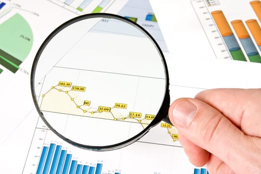 business vision concept. Magnifying glass focusing on a diagram