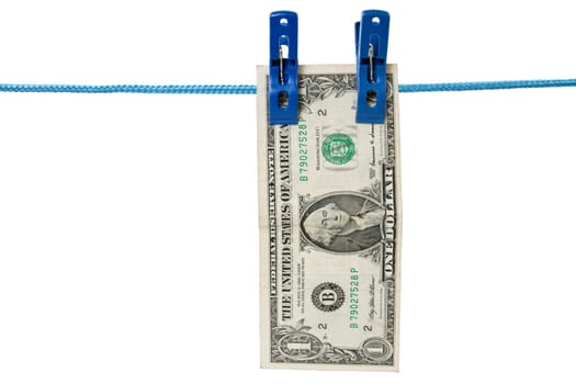one dollar  hung on a washing line, symbolising money laundering