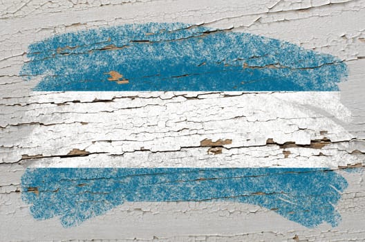 Chalky elsalvador flag painted with color chalk on grunge wooden texture