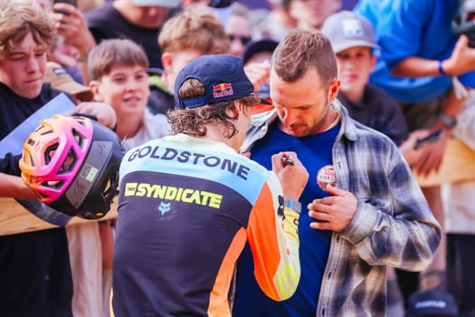 MAYDENA, AUSTRALIA - FEBRUARY 08: Jackson GOLDSTONE of Canada signs autographs after winning Red Bull Hardline Tasmania on February 8, 2025 in Maydena, Australia.