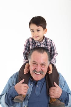 Child and grandfather stay together on white background