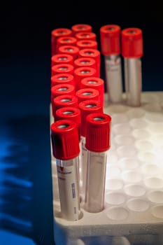 Red headed test tubes placed at curved lines