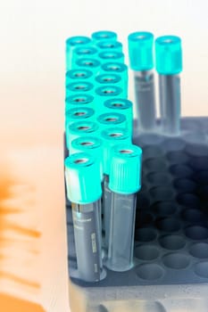 Shaded test tubes placed at two curved lines