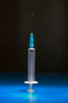 Ready and isolated medical syringe standing head up