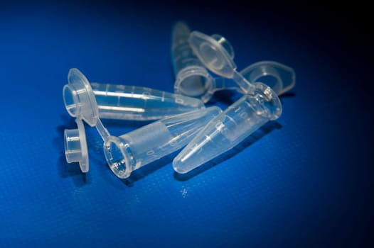 Test tubes laying on table empty and open