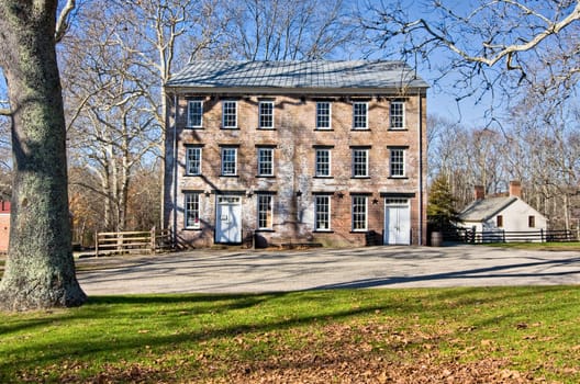 An old general store in Allaire Village, New Jersey. Allaire village was a bog iron industry town in New Jersey during the early 19th century. The general store contained an apothecary, a US Post Office, a Butcher Shop and a Furniture store as well as car