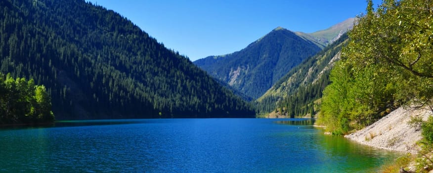 Idyllic Kolsay Lake in kazakhstan mountainscape