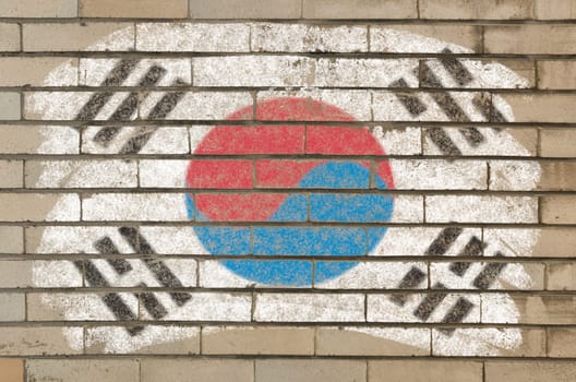 Chalky south korean flag painted with color chalk on grunge old brick wall