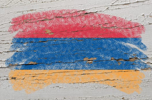 Chalky armenian flag painted with color chalk on grunge wooden texture
