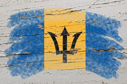 Chalky barbados flag painted with color chalk on grunge wooden texture