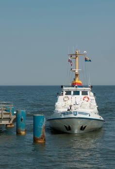 Passenger ship docks to pick up passengers